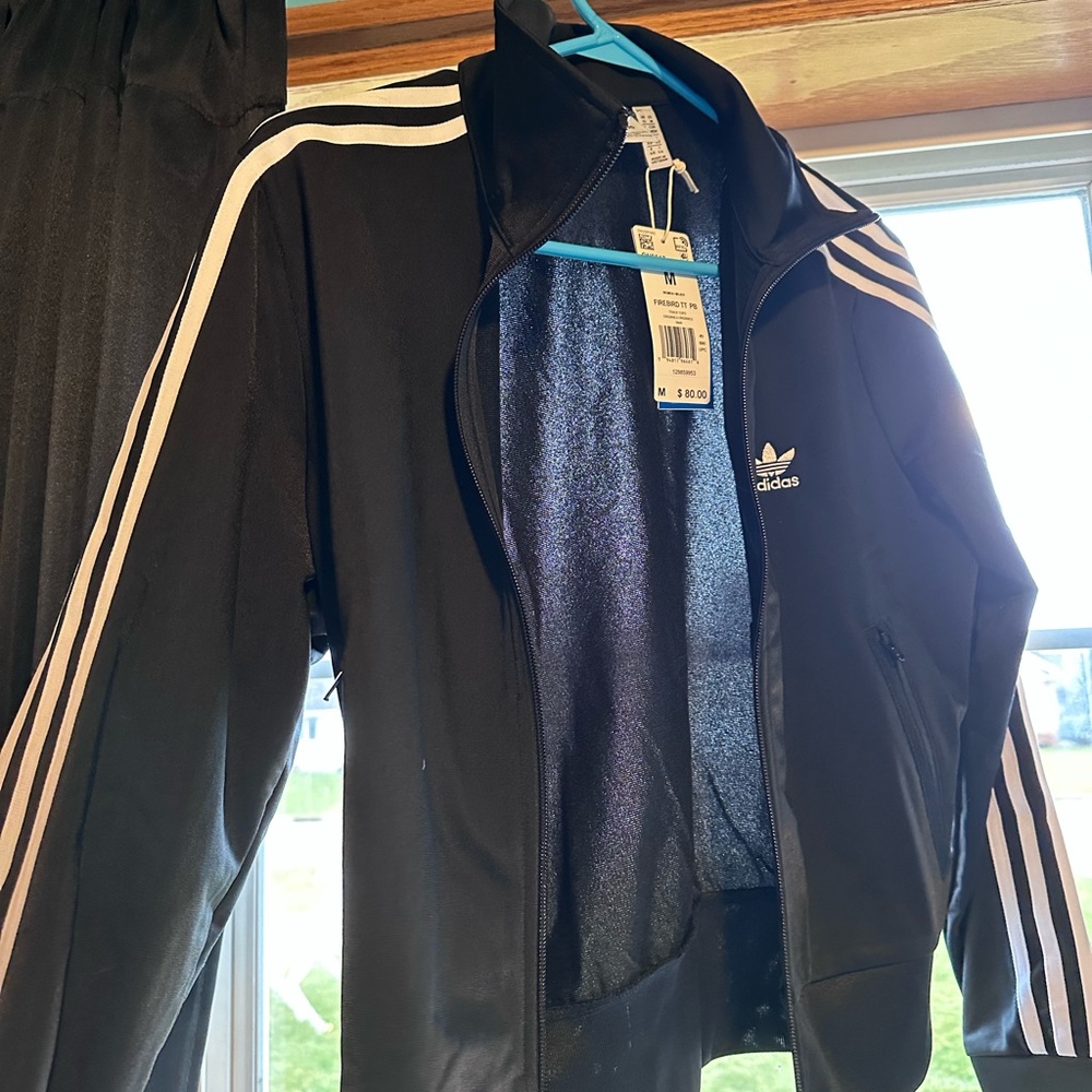 Brand new with tags adidas firebird track jacket size medium.